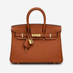 The Odette Top-Handle Bag in Cognac